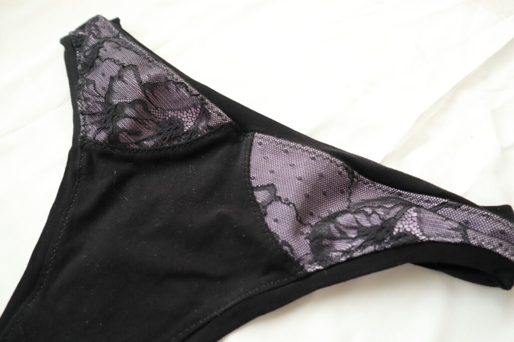 Black and purple underwear with lace accents